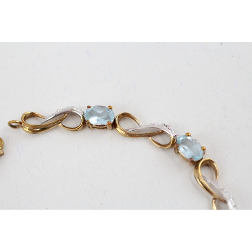 89 - 9ct gold topaz and diamond set line bracelet (5.8g)