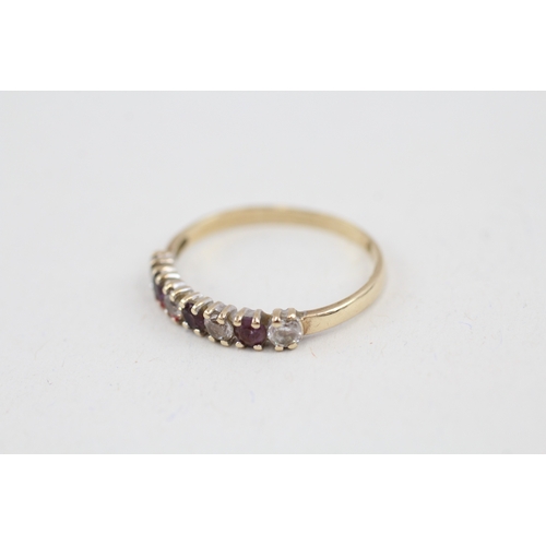 90 - 9ct gold amethyst and cubic zirconia seven stone eternity ring (1.3g) AS SEEN - MISHAPEN Size  N