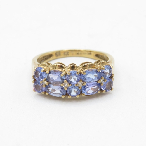 76 - 9ct gold tanzanite and diamond multi row dress ring (2.9g) Size  N