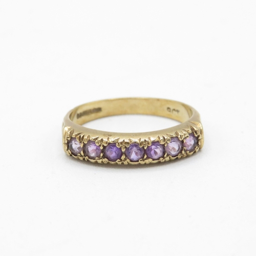 78 - 9ct gold vintage amethyst half eternity ring with patterned shoulders (2.9g) Size  P