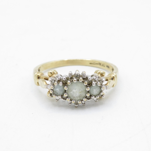 104 - 9ct gold aquamarine three stone ring with diamond surround (3.6g) - AS SEEN - MISHAPEN Size  U