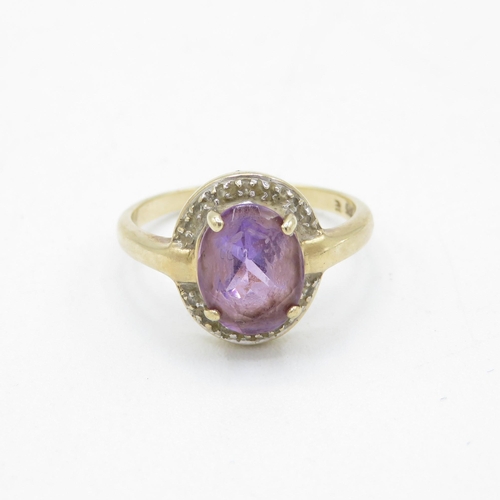 181 - 9ct gold diamond and amethyst halo dress ring (3.3g) Size  P