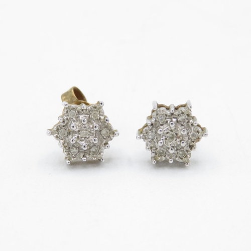 192 - 9ct gold diamond floral cluster stud earrings (1.6g)