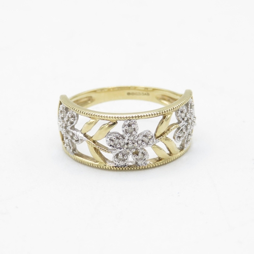 207 - 9ct white & yellow gold diamond openwork floral ring (2.5g) Size  M