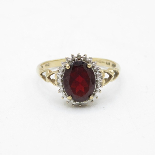 208 - 9ct gold diamond & garnet oval halo ring (2.3g) Size  P