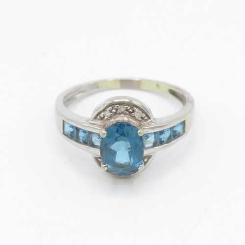 16 - 9ct gold blue topaz & diamond dress ring (3.4g) Size  P