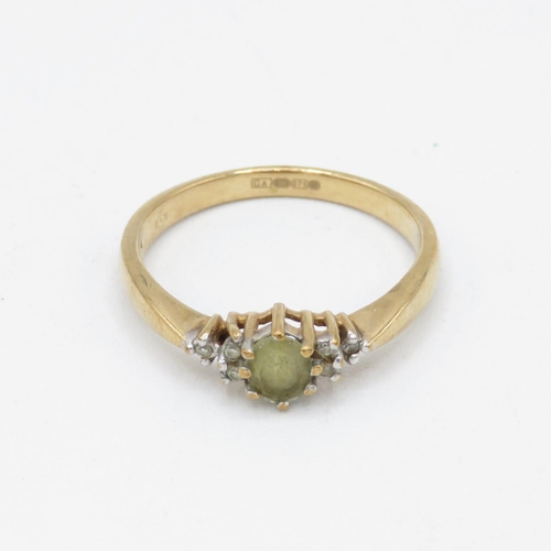 46 - 9ct gold green gemstone & diamond ring (2.2g) Size  P