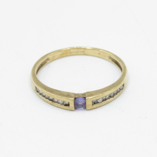 54 - 9ct gold tanzanite & diamond ring (1.7g) Size  P