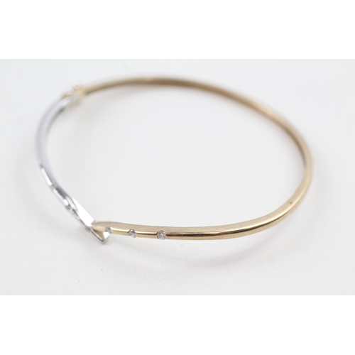 108 - 9ct gold diamond hinged bangle (6.7g)