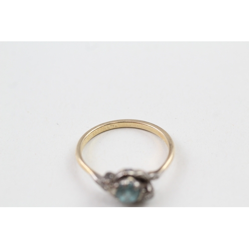 109 - 9ct gold vintage blue zirconia & diamond dress ring (3.6g) Size  U