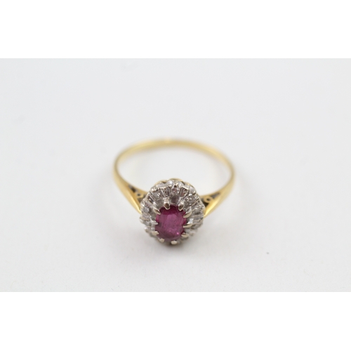 121 - 18ct gold ruby and diamond cluster dress ring (3g) Size  M