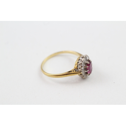 121 - 18ct gold ruby and diamond cluster dress ring (3g) Size  M