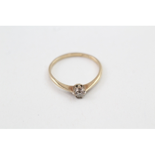 124 - 9ct gold diamond solitaire dress ring (1.2g) Size  M