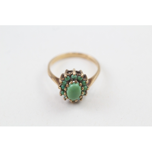 126 - 9ct gold vintage turquoise halo dress ring (2g) Size  O