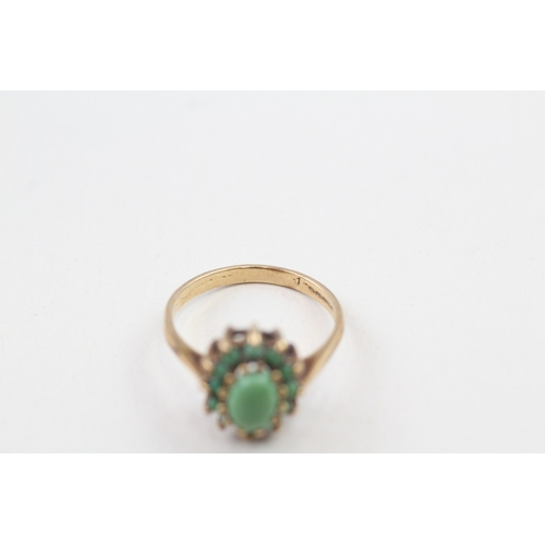 126 - 9ct gold vintage turquoise halo dress ring (2g) Size  O