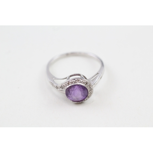 131 - 9ct white gold amethyst and diamond dress ring (2.7g) Size  T