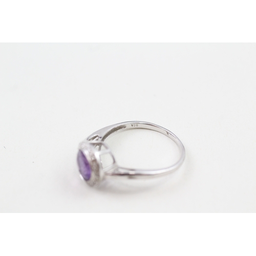 131 - 9ct white gold amethyst and diamond dress ring (2.7g) Size  T