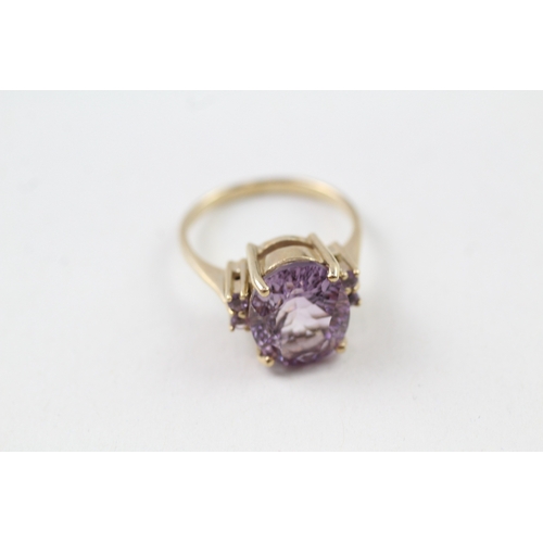 137 - 9ct gold amethyst solitaire cocktail ring with amethyst set shoulders (4.3g) Size  O