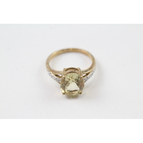 141 - 9ct gold citrine & diamond ring (3.4g) Size  N