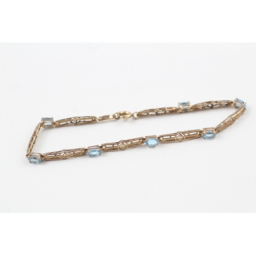 148 - 9ct gold topaz bracelet with Mackintosh inspired design (3.9g)