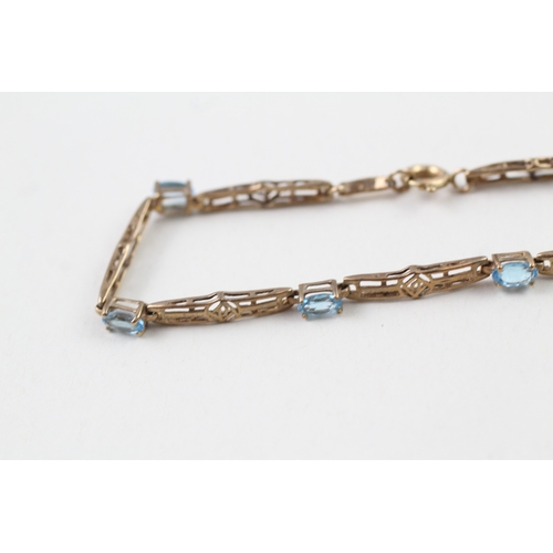 148 - 9ct gold topaz bracelet with Mackintosh inspired design (3.9g)