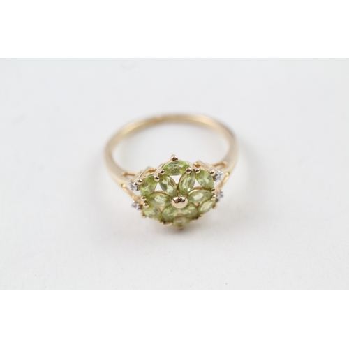 151 - 10ct gold diamond and yellow gemstone floral cluster dress ring (2.3g) Size  N