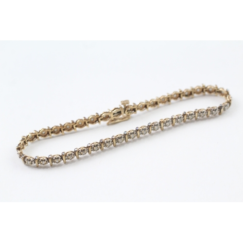 157 - 9ct gold diamond line bracelet (7g)