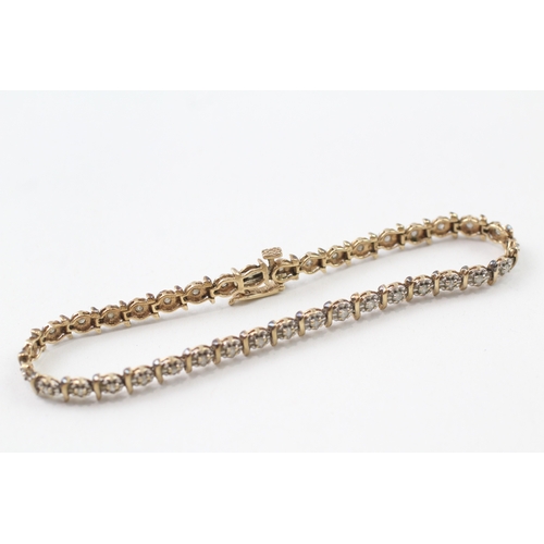 157 - 9ct gold diamond line bracelet (7g)