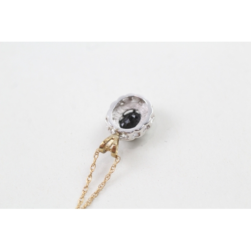 158 - 9ct gold sapphire and diamond halo pendant with 9ct gold chain (2.5g)