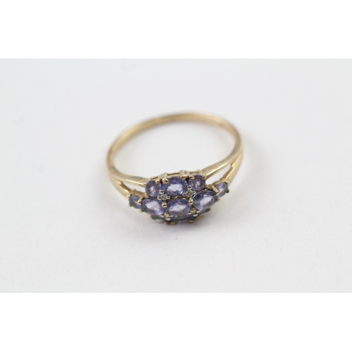 160 - 9ct gold tanzanite cluster dress ring (2.5g) Size  S