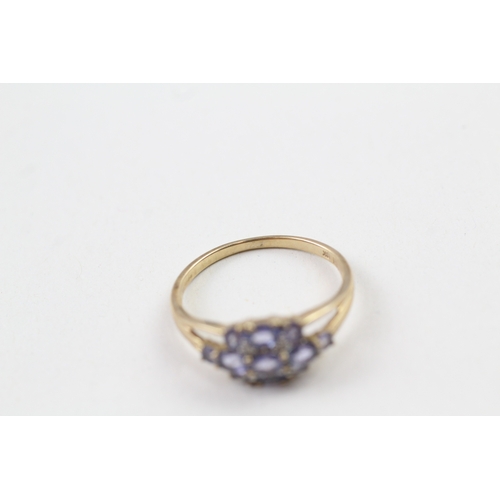 160 - 9ct gold tanzanite cluster dress ring (2.5g) Size  S