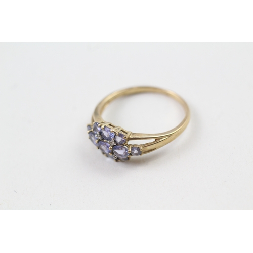 160 - 9ct gold tanzanite cluster dress ring (2.5g) Size  S