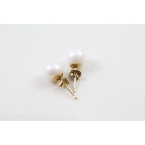 167 - 18ct gold cultured pearl stud earrings (1.3g)