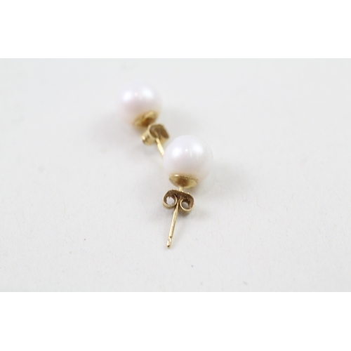 167 - 18ct gold cultured pearl stud earrings (1.3g)