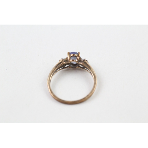 18 - 9ct gold tanzanite solitaire dress ring with diamond set shoulders (1.8g) Size  O