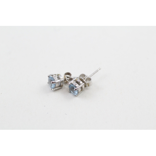 197 - 9ct white gold round cut aquamarine stud earrings (0.9g)