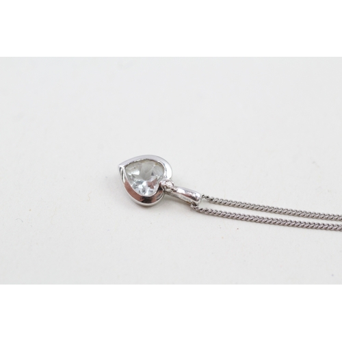 198 - 9ct white gold aquamarine and diamond heart pendant with 9ct white gold chain (2.1g)