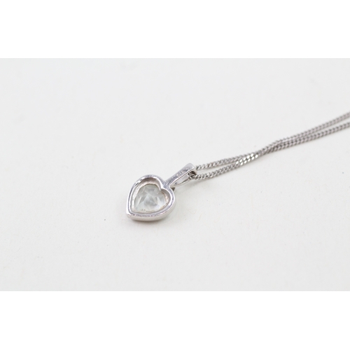 198 - 9ct white gold aquamarine and diamond heart pendant with 9ct white gold chain (2.1g)