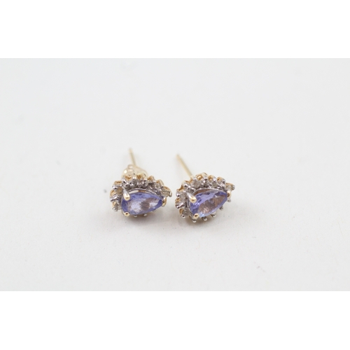 200 - 9ct gold pear cut tanzanite and diamond halo stud earrings (1.2g)