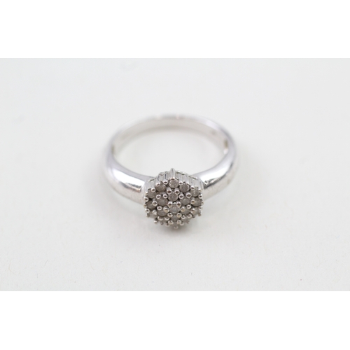 208 - 9ct white gold diamond cluster ring (3.4g) Size  N