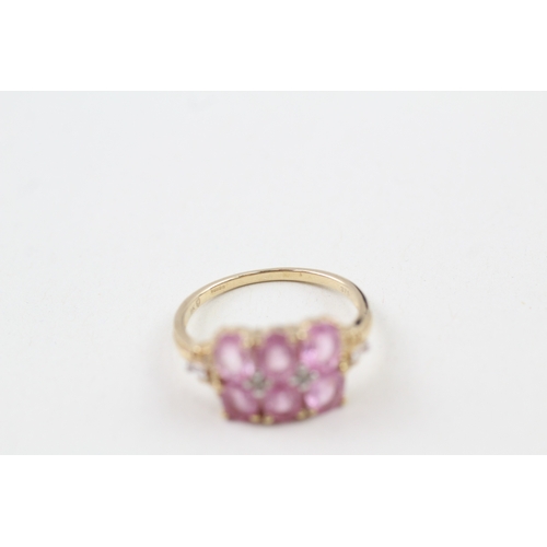 210 - 9ct gold pink sapphire & white gemstone dress ring (2.4g) Size  O