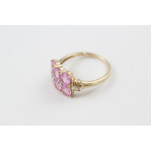 210 - 9ct gold pink sapphire & white gemstone dress ring (2.4g) Size  O