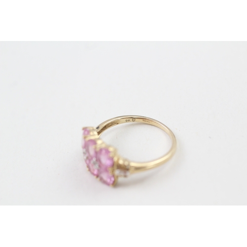 210 - 9ct gold pink sapphire & white gemstone dress ring (2.4g) Size  O