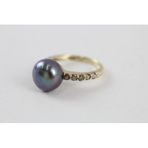 217 - 9ct gold cultured pearl dress ring with gemstone shoulders (2.4g) Size  J 1/2