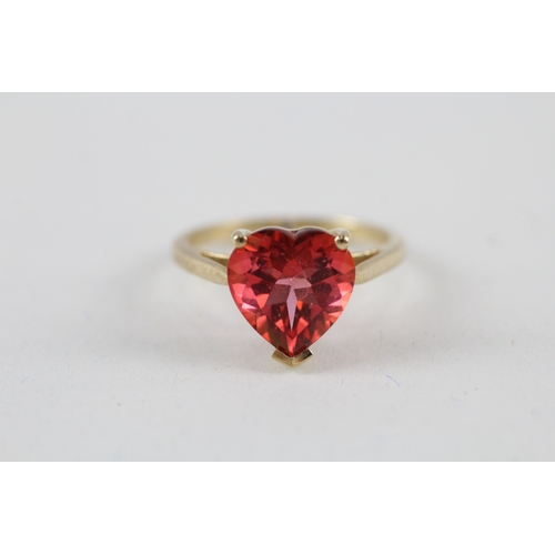 220 - 9ct gold heart cut red gemstone dress ring (2.8g) Size  O