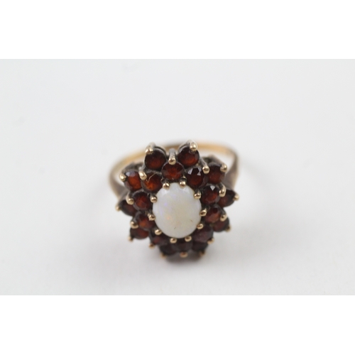 38 - 9ct gold vintage opal and garnet halo cluster cocktail ring (4.2g) Size  R