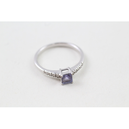 44 - 9ct white gold tanzanite solitaire dress ring with diamond set shoulders (1.8g) Size  N