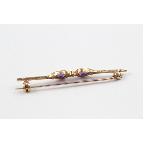 49 - 9ct gold pear cut amethyst and diamond bar brooch (2.4g)