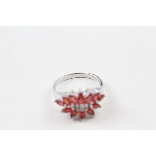 51 - 9ct gold red gemstone cluster ring (4.2g) Size  N