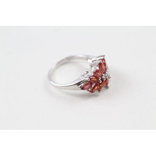 51 - 9ct gold red gemstone cluster ring (4.2g) Size  N